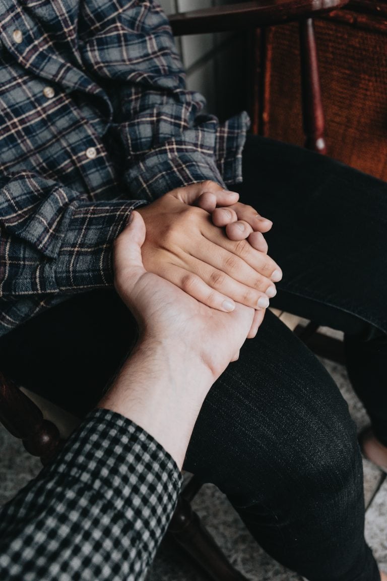 People holding hands, self help and depression concept, minimal copy space