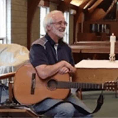 Bruce with his guitar at the Food Pantry